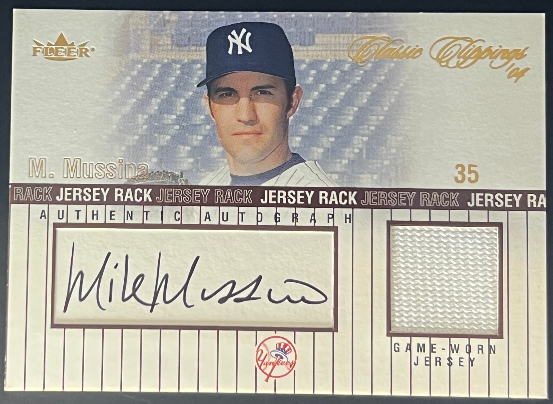 2004 Fleer Classic Clippings Mike Mussina Jersey Rack Bronze 125/149